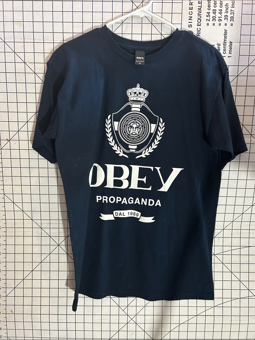 Obey Navy Short Sleeve Tee with White Crest Graphic